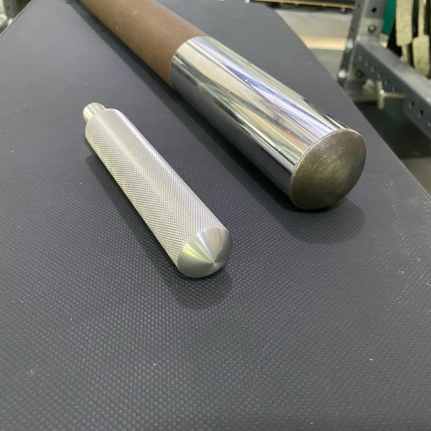 Close-up of Iron Pillow knurled handle and steel construction details